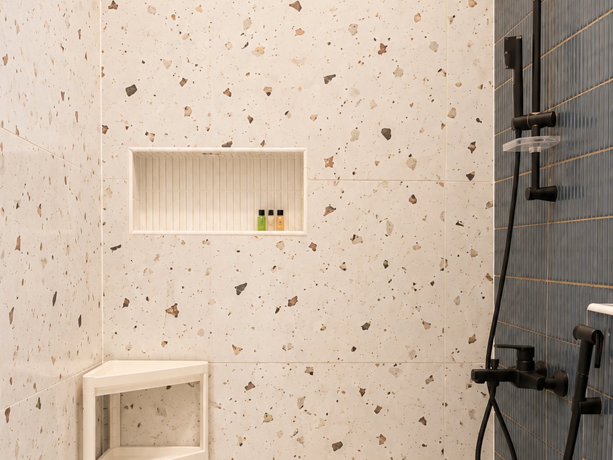 En-suite bathroom with terrazzo tile and rain shower at RYST 109A, Pearl Beach, Cheyyur