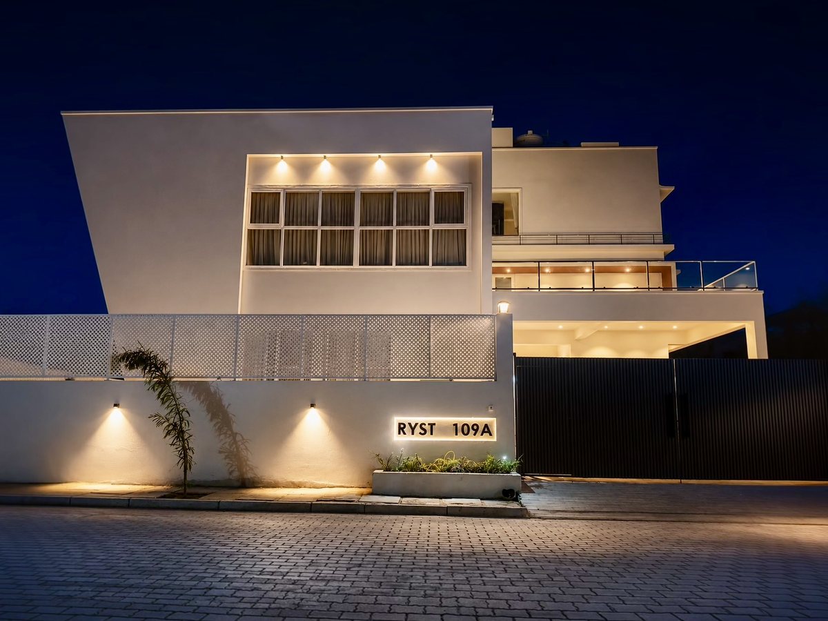 RYST 109A villa exterior and entrance gate at night, Pearl Beach, Cheyyur