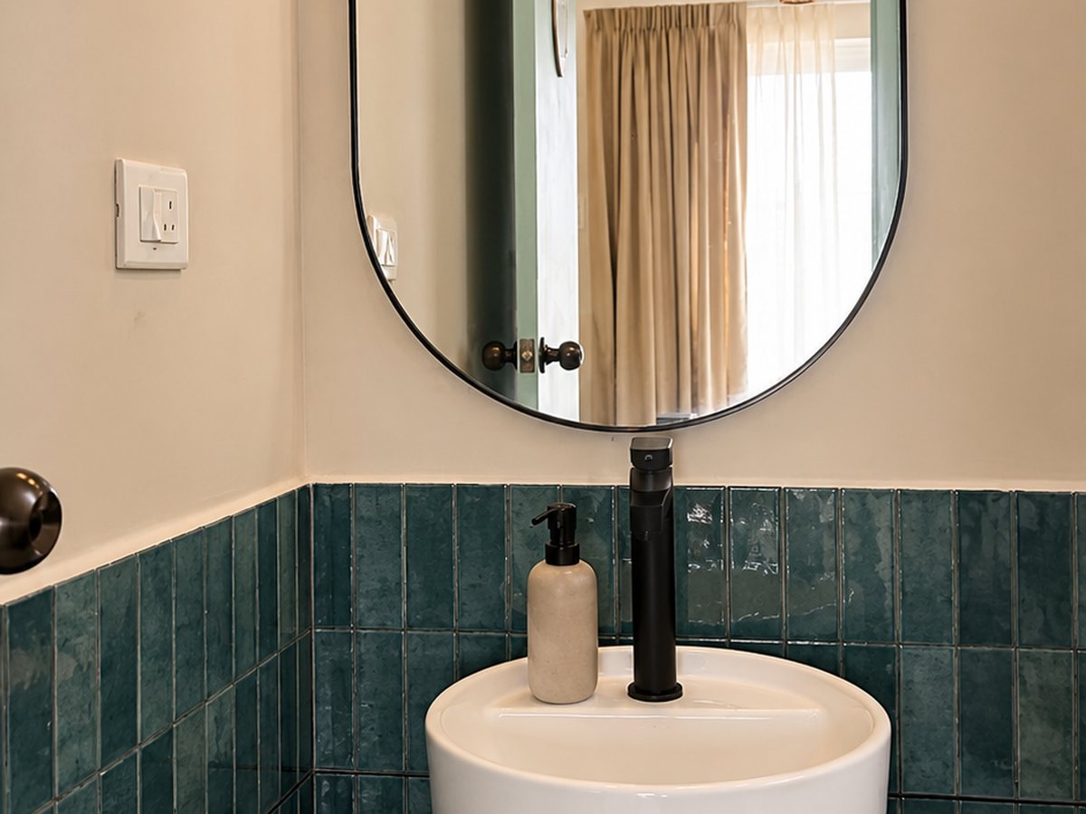 Designer powder room with tiled washbasin at RYST 109A, Pearl Beach, Cheyyur